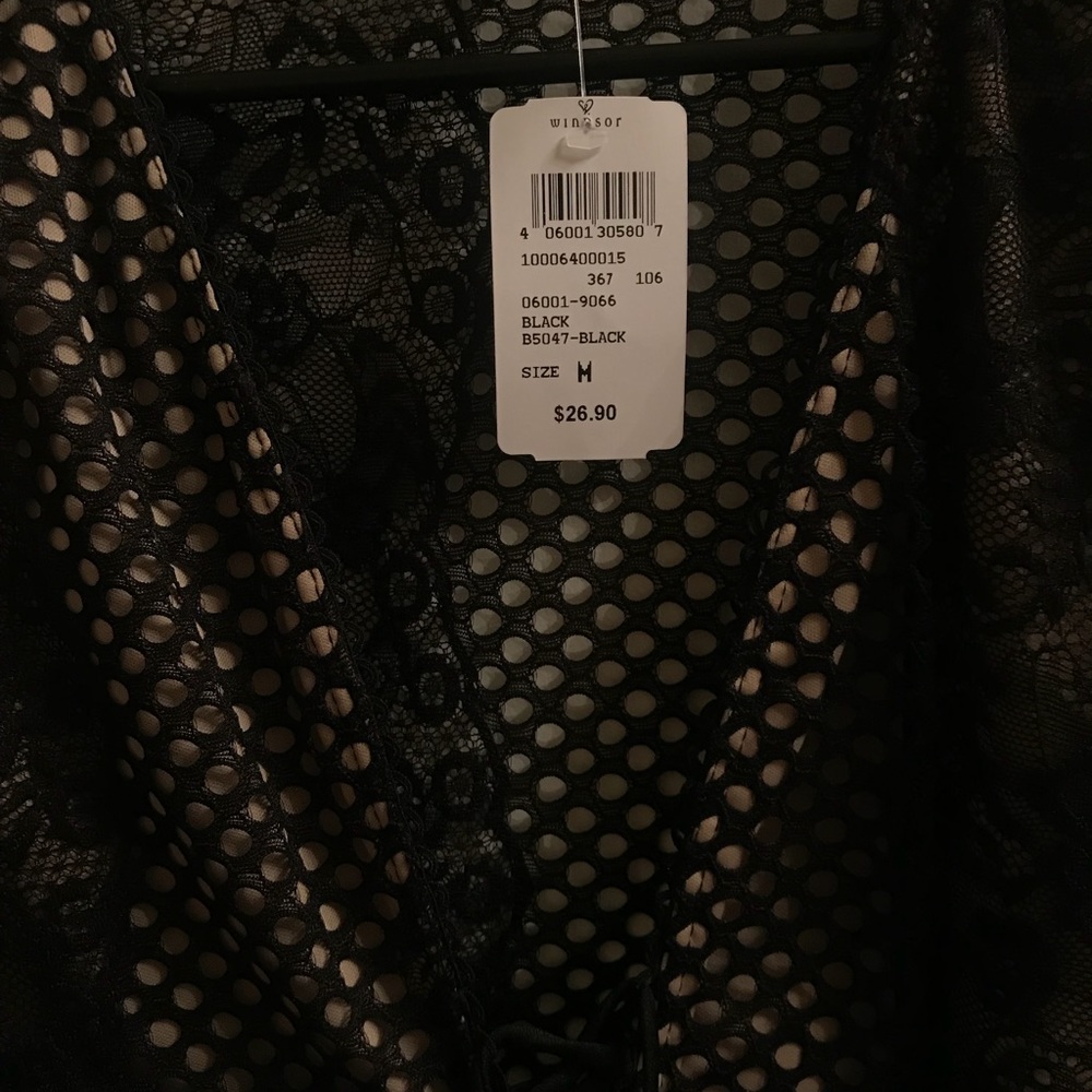 Medium Windsor Black lowcut bodysuit.